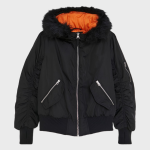 Black puffer bomber jacket with fur-trimmed hood featuring orange lining, front zipper closure, ribbed cuffs and hem, and zippered front pockets displayed flat on white background.