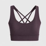 Eggplant purple sports bra back view on white studio background, crisscross multi-strap detail