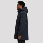 Men's navy parka side profile, hood, drawcord, side seam pockets, long length, button cuff