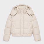Women's cream puffer jacket flat lay front view on white background, oversized hood, snap-button front, twin welt hand pockets