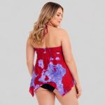 Women's plus-size red and purple watercolor print halter neck tankini top with matching black brief model back view, halter neck tie at back