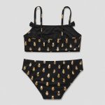 Front flat-lay black with gold pineapple print