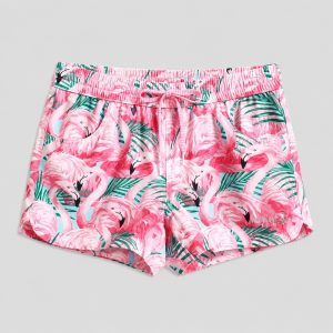 Front flat-lay multicolor flamingo + tropical leaf print swim trunks