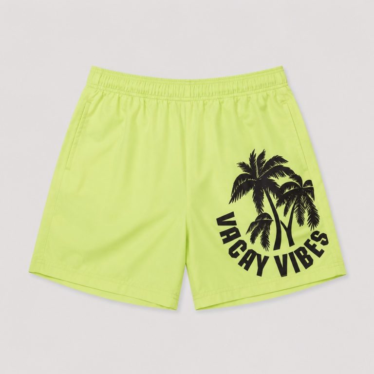 Front flat-lay neon yellow swim trunks with VACAY VIBES palm tree graphic