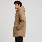 Men's sherpa-lined hooded parka jacket in khaki - model side view