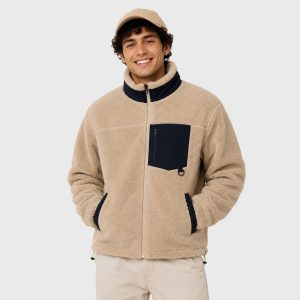Men's sherpa fleece jacket in cream with navy blue contrast collar, chest zip pocket, twin zip hand pockets - model front view, OEM wholesale men's outerwear