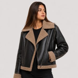 Women's PU leather jacket in black with tan sherpa fleece collar, lapels, cuffs and hem - model front view, OEM wholesale women's outerwear
