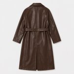 Women's long PU leather trench coat in chocolate brown with double-breasted front, wide notched lapels, leather belt, side slash pockets - flat back view, OEM wholesale women's outerwear