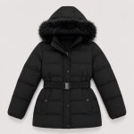 Women's puffer parka in black with faux fur trim hood, belted waist, mid-thigh length - flat front view, OEM wholesale women's outerwear