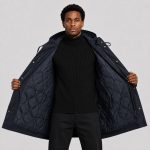 Men's navy hooded utility parka - model view showing fully open jacket revealing quilted navy interior lining, OEM wholesale outerwear