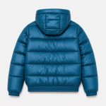 Women's cropped lightweight puffer jacket in petrol blue with hood, twin zip hand pockets, elasticated ribbed cuffs and hem - flat back view, OEM wholesale women's outerwear