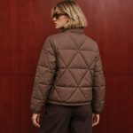 Women's diamond-quilt puffer jacket in chocolate brown with stand collar, twin zip hand pockets, elasticated ribbed cuffs and hem - model back view, OEM wholesale women's outerwear