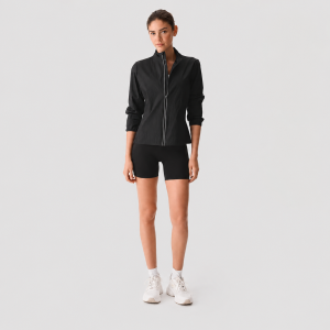Women's black high-waisted biker workout shorts, front full body view, white sneakers