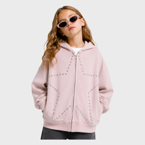 Young girl wearing pink cat-eye sunglasses, front view of dusty pink zip-up hooded sweatshirt with silver stud star design and front pockets.