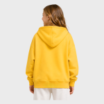 Back view of a model wearing a solid yellow hooded sweatshirt with ribbed cuffs and hem, paired with white pants on a white studio background.