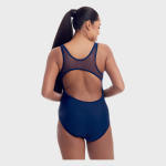 Back view of a plus-size model wearing a navy blue one-piece swimsuit featuring a sheer mesh racerback panel and a keyhole cutout at the mid-back.