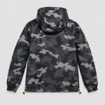 Boy's dark gray black and white abstract geometric halftone camo print hooded windbreaker back view, hood with neon yellow green drawstring tied at hem with toggle, mesh inner lining at hood edge, ribbed elasticated cuffs, kid model back view, no text or logo